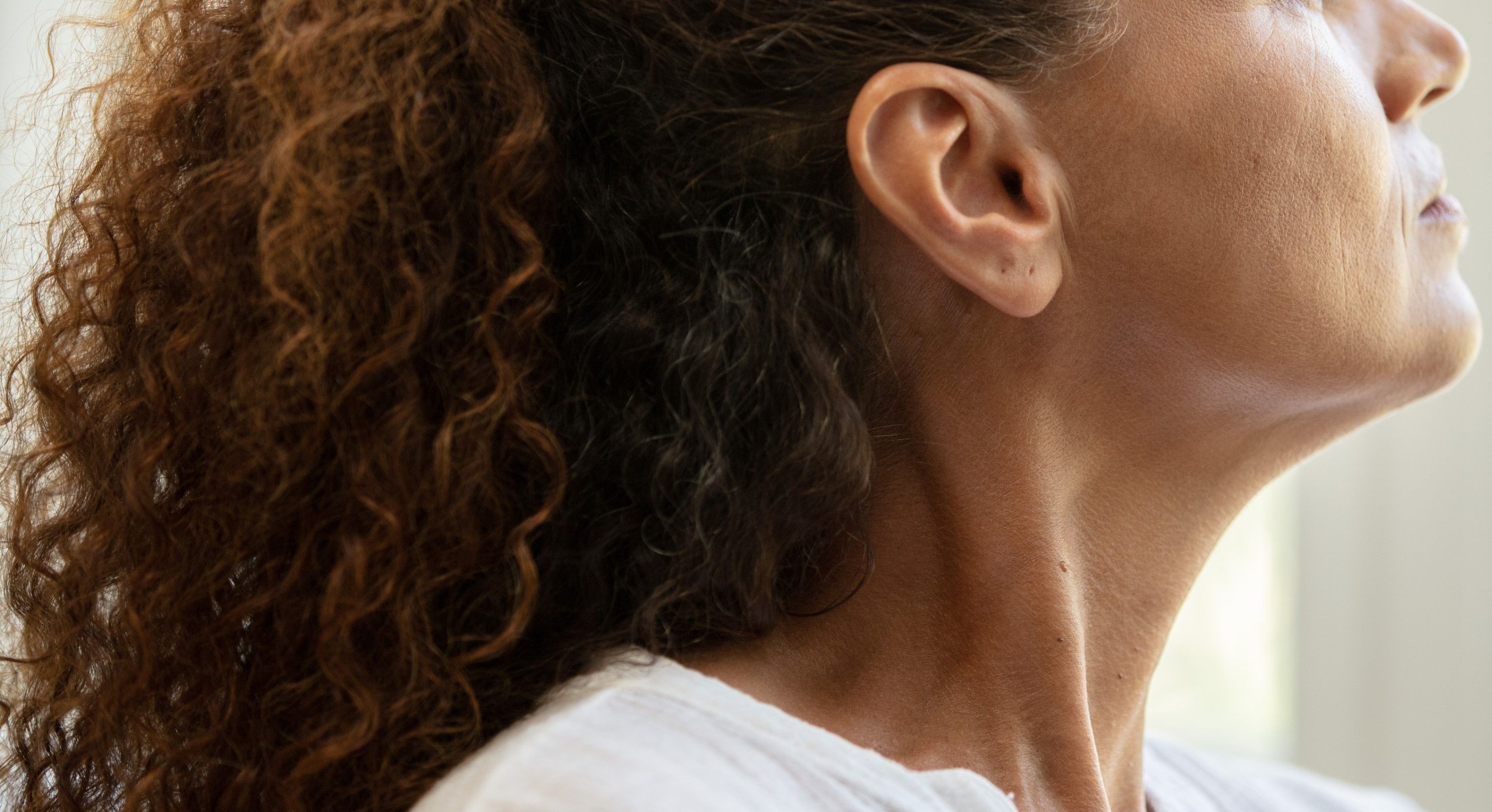 Side portrait close up of a woman's neck
